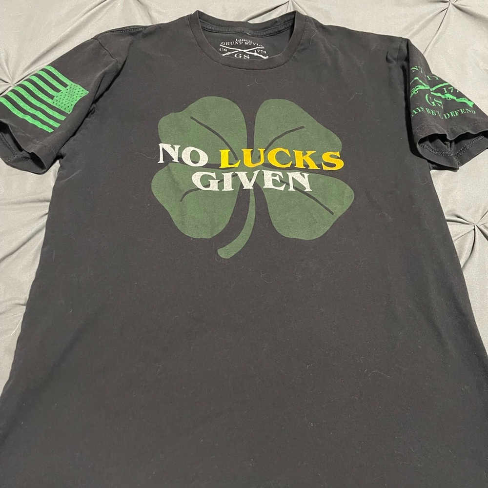 Grunt Style Black Tee with Green and Yellow Clover Design